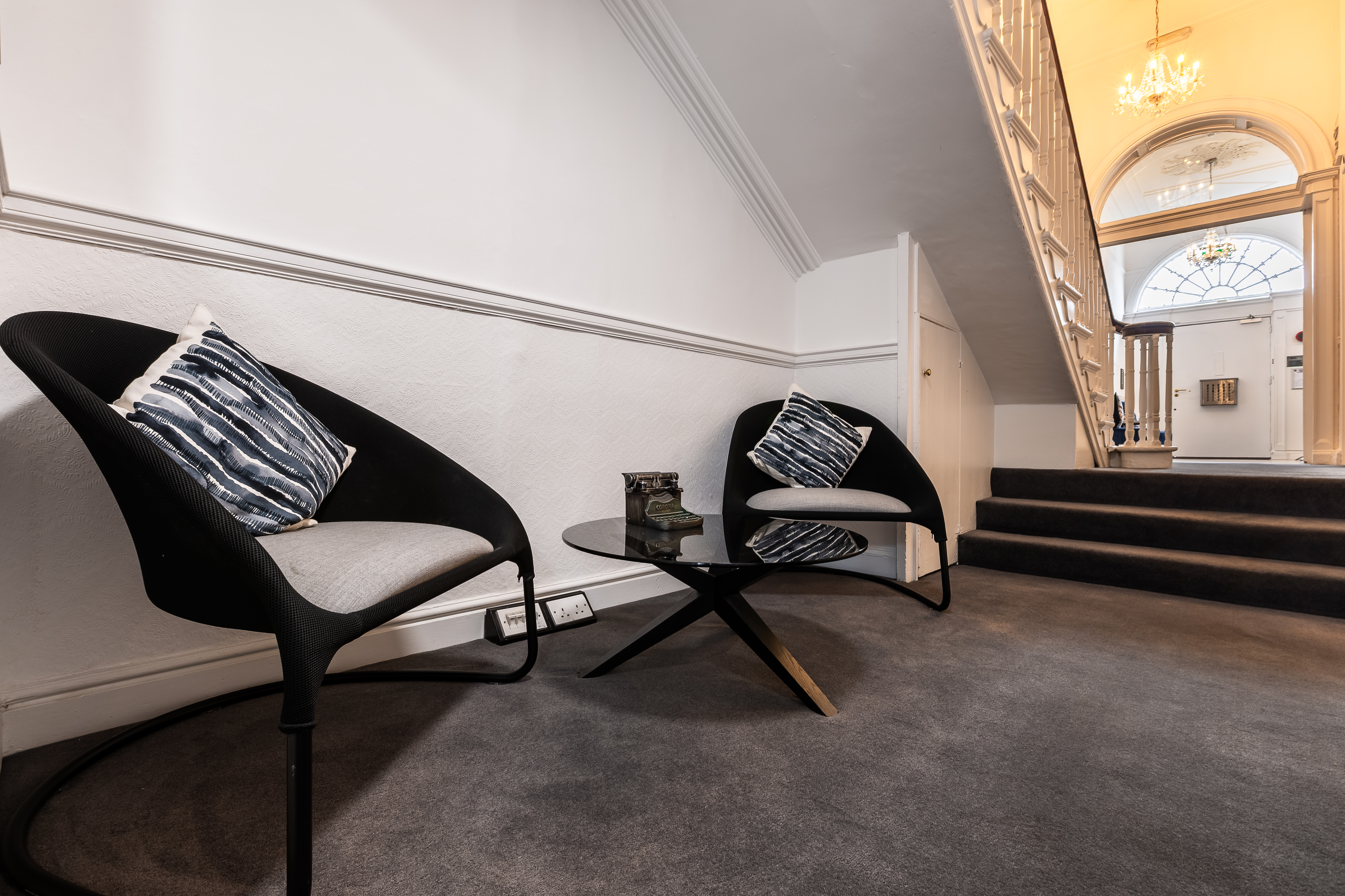 14 Fitzwilliam Square — lounge area with staircase