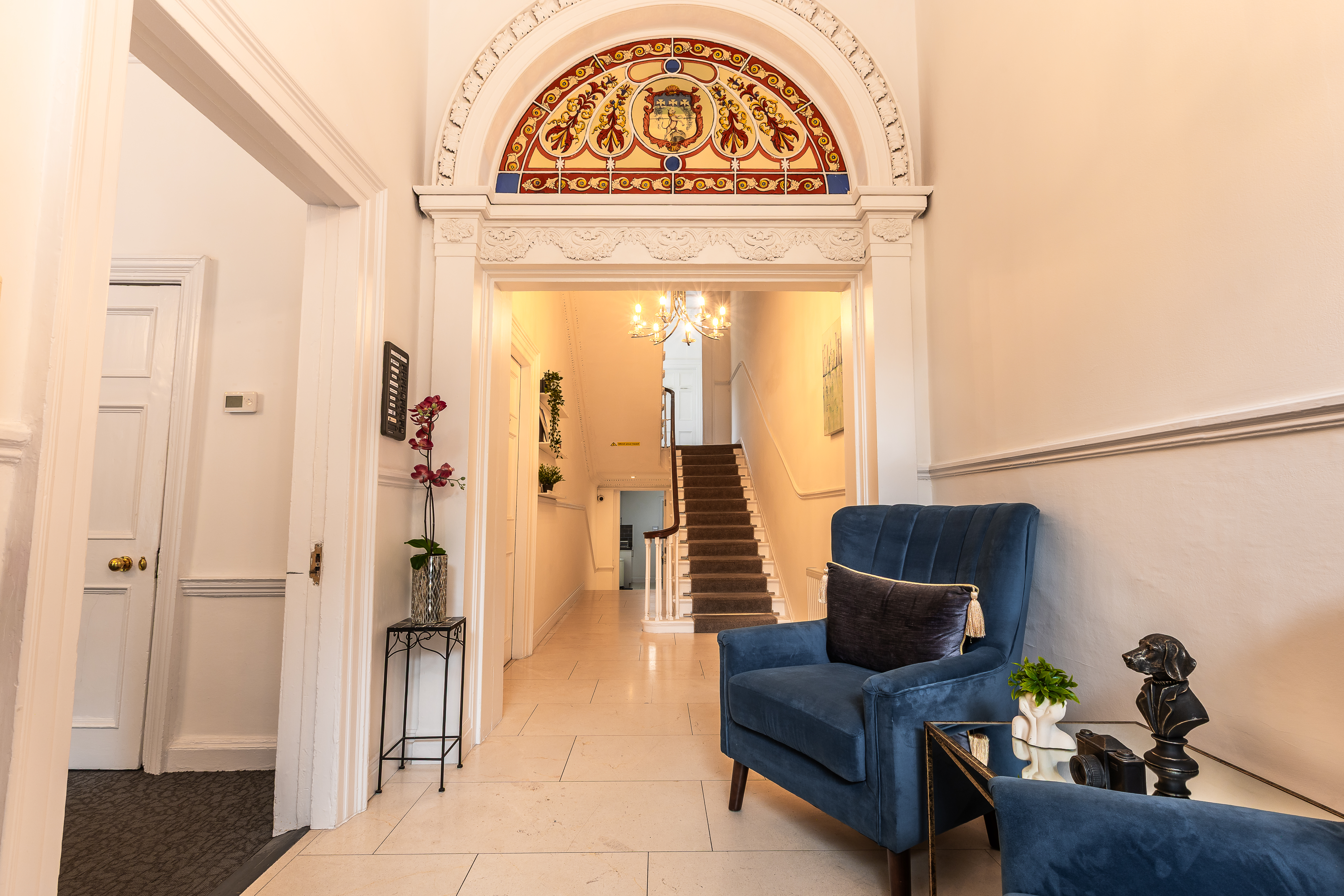 57 Fitzwilliam Square — entrance hall with ornate stained glass fanlight
